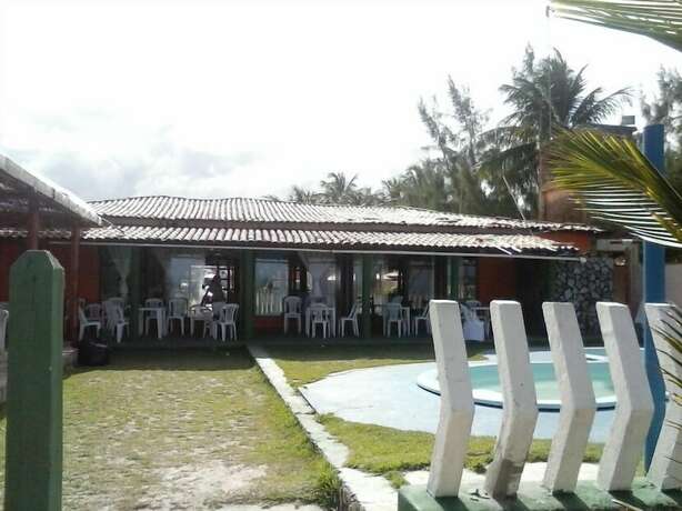 Imagen general del Hotel Chalés Suítes Pé na Areia - Praia de Guaibim - Bahia. Foto 14