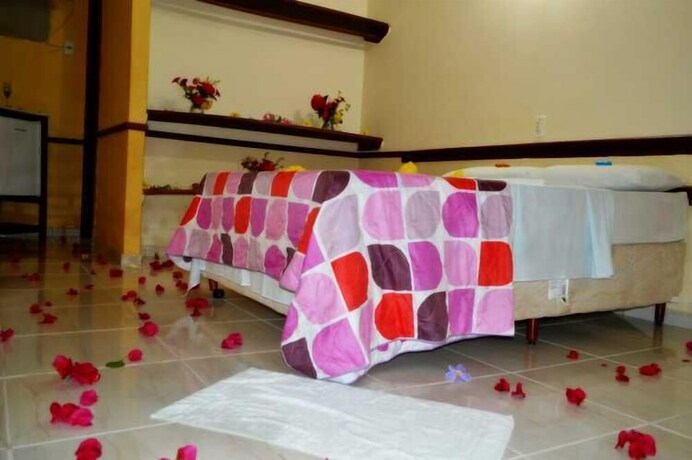 Imagen de la habitación del Hotel Chalés Suítes Pé na Areia - Praia de Guaibim - Bahia. Foto 20