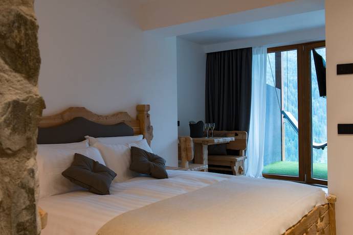 Imagen de la habitación del Hotel Chalet Al Foss. Foto 7