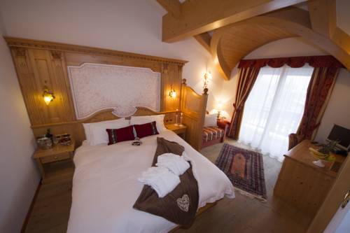 Imagen de la habitación del Hotel Chalet All'imperatore. Foto 10
