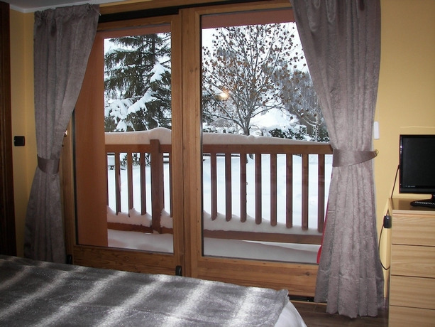 Imagen de la habitación del Hotel Chalet Alpina and Apartments. Foto 11
