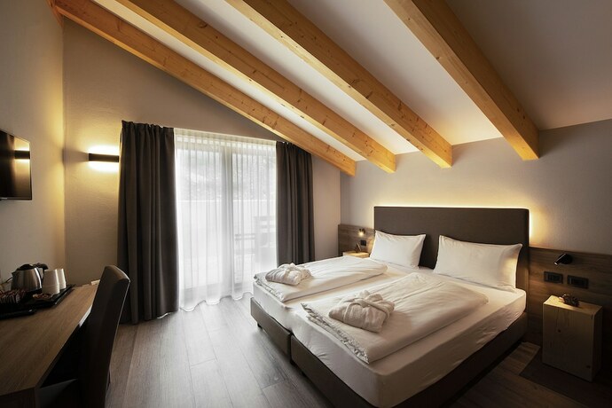 Imagen de la habitación del Hotel Chalet Aster. Foto 18
