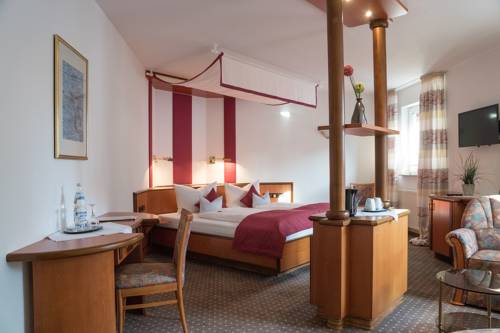 Imagen de la habitación del Hotel Chalet, Bad Zwischenahn. Foto 11