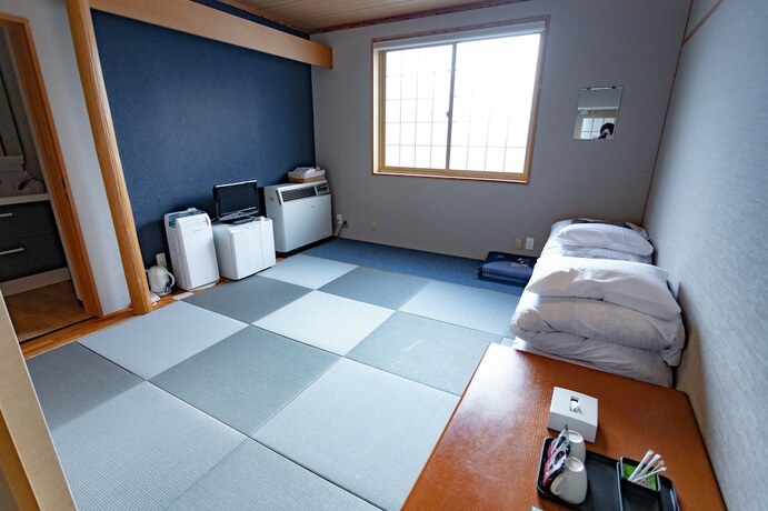 Imagen de la habitación del Hotel Chalet Burlap Furanui. Foto 11