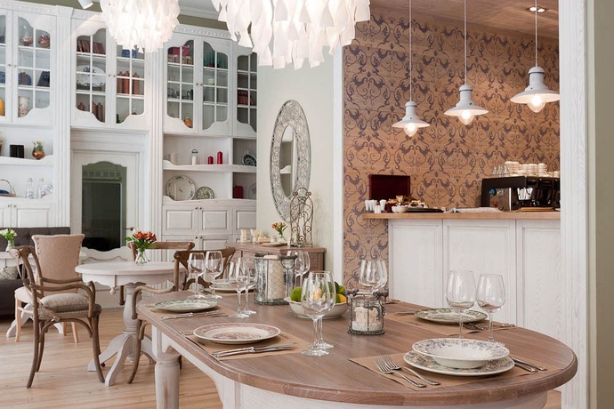 Imagen del bar/restaurante del Hotel Chalet De Provence Kolomenskaya. Foto 3