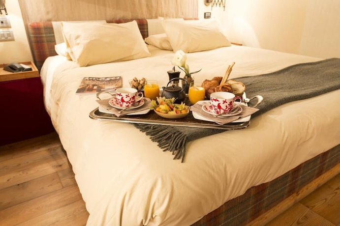 Imagen de la habitación del Hotel Chalet Eden. Foto 11