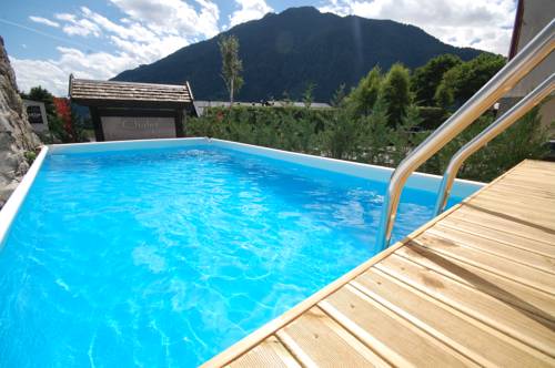 Imagen de la piscina del Hotel Chalet Fiocco Di Neve. Foto 17
