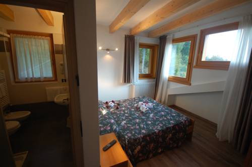 Imagen de la habitación del Hotel Chalet Fiocco Di Neve. Foto 7