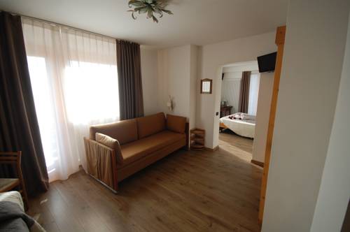 Imagen de la habitación del Hotel Chalet Fiocco Di Neve. Foto 15