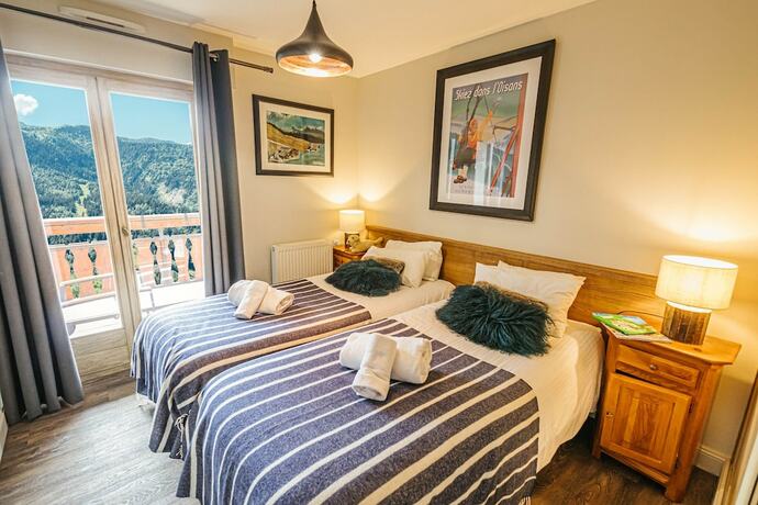 Imagen de la habitación del Hotel Chalet La Perle d\'Oisans. Foto 11