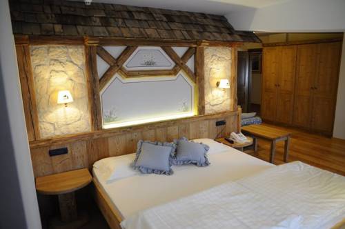 Imagen de la habitación del Hotel Chalet Piereni. Foto 5