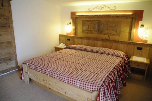 Imagen de la habitación del Hotel Chalet Piereni. Foto 6