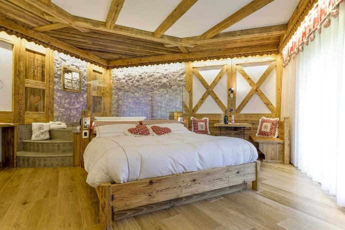 Imagen de la habitación del Hotel Chalet Pineta. Foto 11