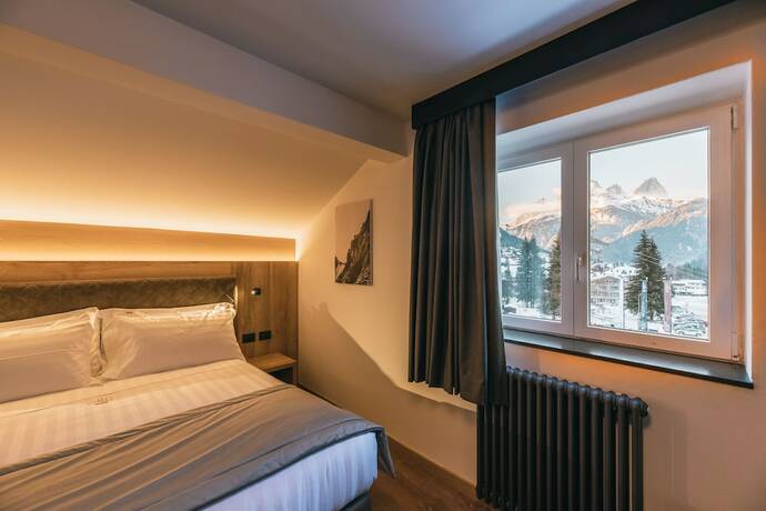 Imagen de la habitación del Hotel Chalet Queen. Foto 12