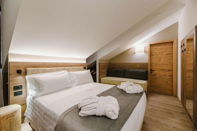 Imagen de la habitación del Hotel Chalet Queen. Foto 13