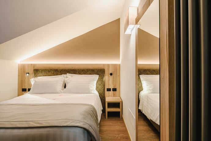Imagen de la habitación del Hotel Chalet Queen. Foto 16