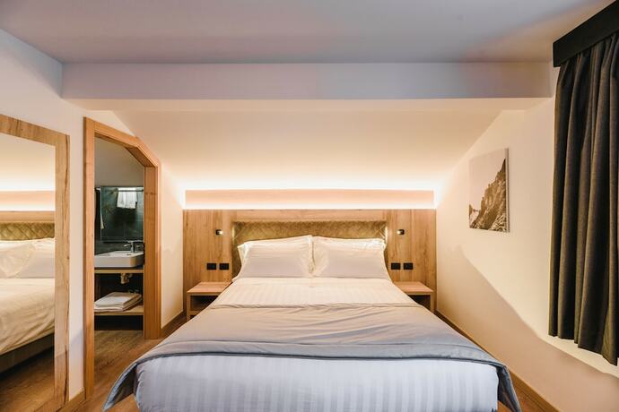 Imagen de la habitación del Hotel Chalet Queen. Foto 18
