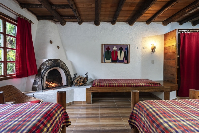 Imagen de la habitación del Hotel Chalet de La Cocha. Foto 7
