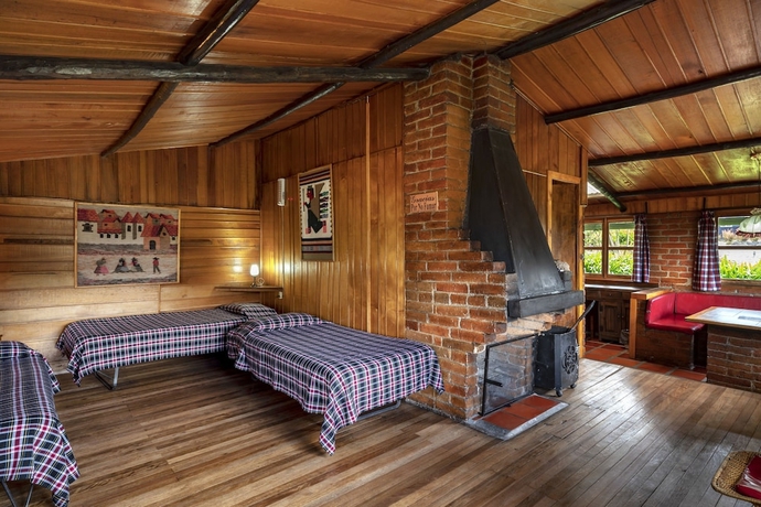 Imagen de la habitación del Hotel Chalet de La Cocha. Foto 8