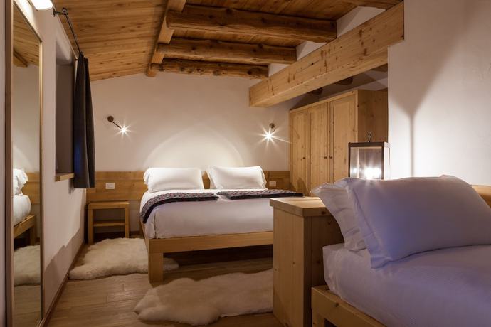Imagen de la habitación del Hotel Chalet-H&ocirc;tel Borgo Eibn Mountain Lodge (Relais du Silence). Foto 4