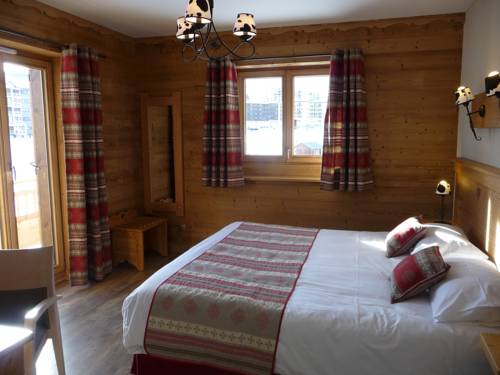 Imagen de la habitación del Hotel Chalet-H&ocirc;tel Le Beausoleil, The Originals Relais. Foto 12