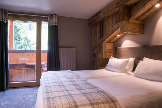 Imagen de la habitación del Hotel Chalet-H&ocirc;tel Les Gentianettes, The Originals Relais (H&ocirc;tels-Chalets de Tradition). Foto 8