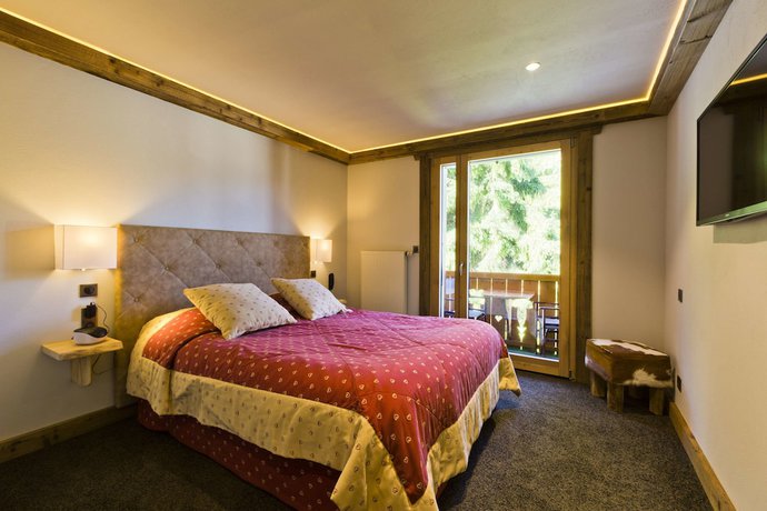 Imagen de la habitación del Hotel Chalet-H&ocirc;tel Les Gentianettes, The Originals Relais (H&ocirc;tels-Chalets de Tradition). Foto 14