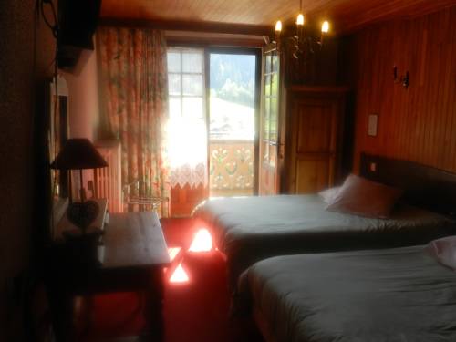Imagen de la habitación del Hotel Chalet-h&ocirc;tel Du Borderan. Foto 8