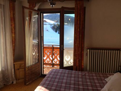 Imagen de la habitación del Hotel Chalet-h&ocirc;tel Du Borderan. Foto 11