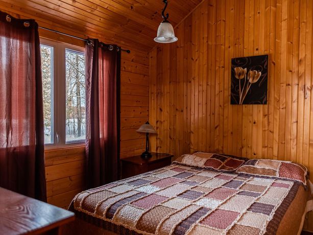Imagen de la habitación del Hotel Chalets and Spa Lac Saint-Jean. Foto 14