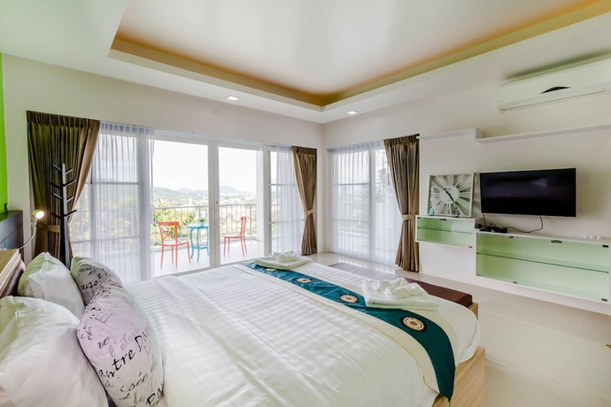 Imagen de la habitación del Hotel Chalong Hill Tropical Garden Homes. Foto 4