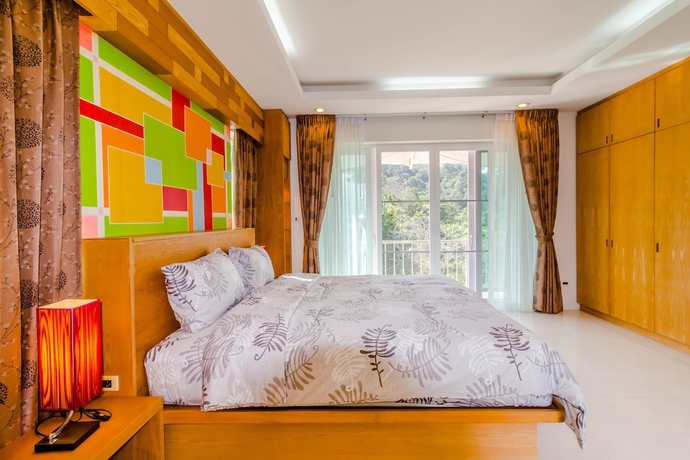 Imagen de la habitación del Hotel Chalong Hill Tropical Garden Homes. Foto 6