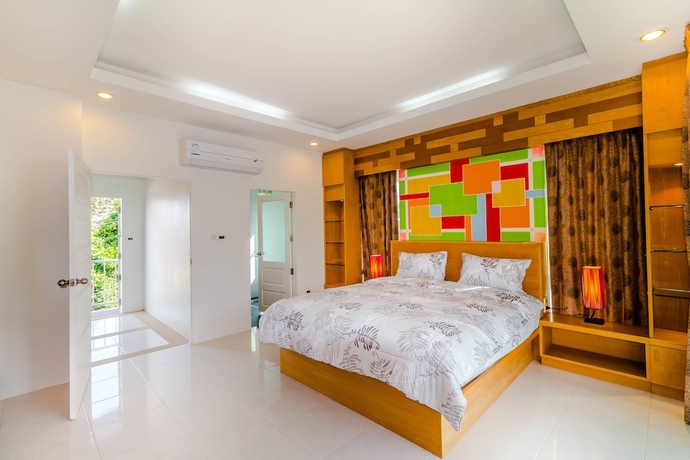 Imagen de la habitación del Hotel Chalong Hill Tropical Garden Homes. Foto 9
