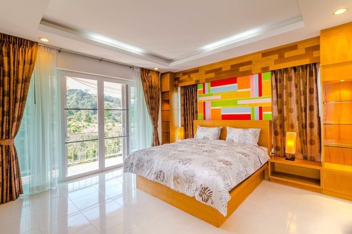 Imagen de la habitación del Hotel Chalong Hill Tropical Garden Homes. Foto 10