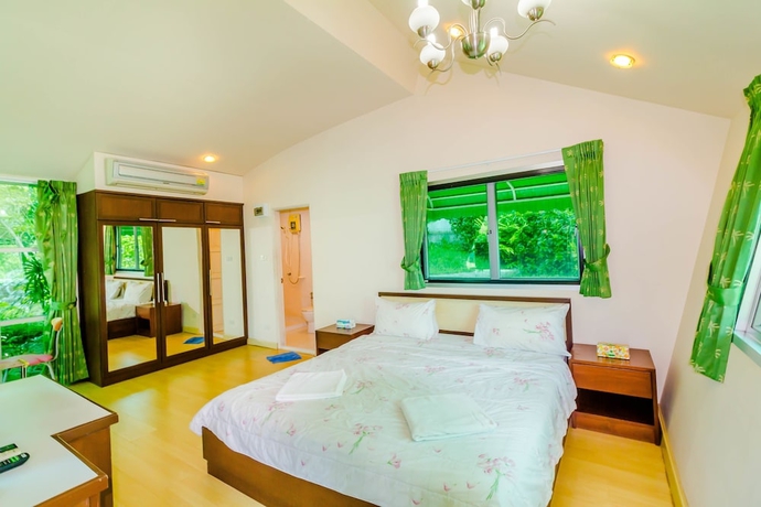 Imagen de la habitación del Hotel Chalong Hill Tropical Garden Homes. Foto 13