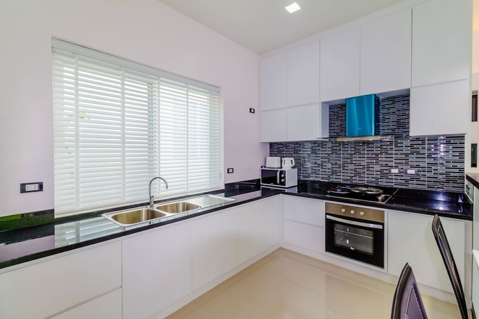 Imagen de la habitación del Hotel Chalong Hill Tropical Garden Homes. Foto 18