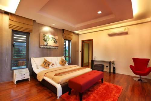 Imagen de la habitación del Hotel Chalong Miracle Lakeview Resort and Spa. Foto 4