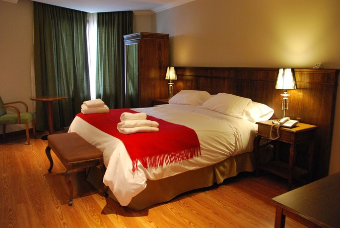 Imagen de la habitación del Hotel Chalten Suites. Foto 10