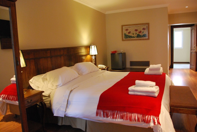 Imagen de la habitación del Hotel Chalten Suites. Foto 11