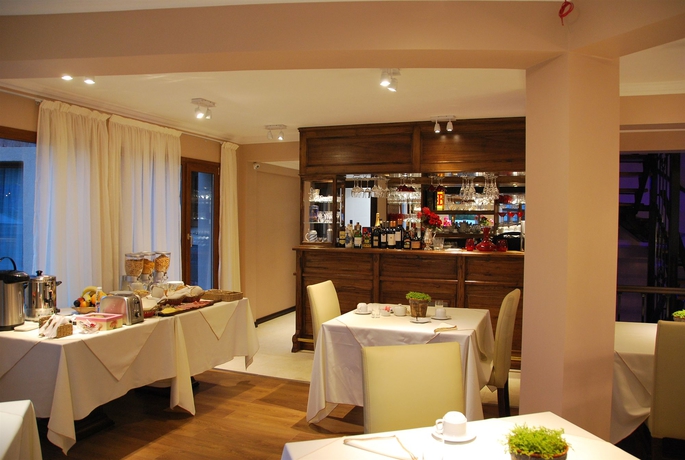 Imagen del bar/restaurante del Hotel Chalten Suites. Foto 9