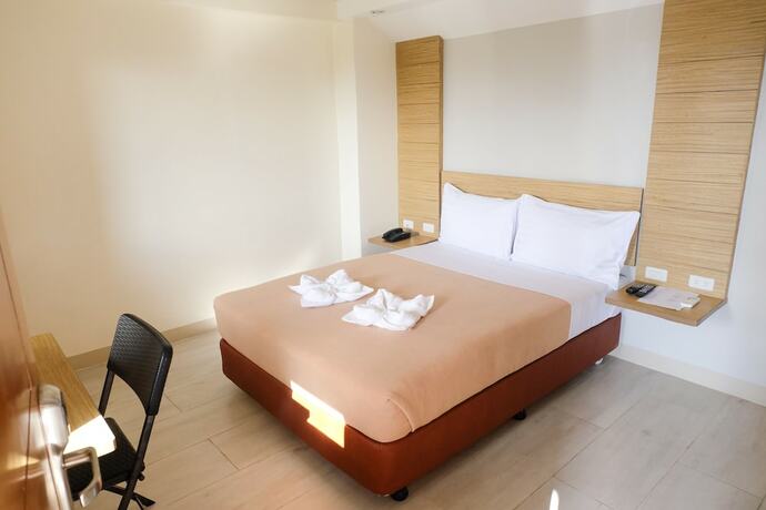 Imagen de la habitación del Hotel Chambre Mactan. Foto 14