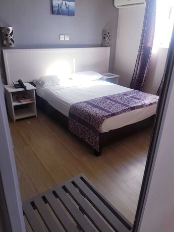 Imagen de la habitación del Hotel Champ De Mars. Foto 17