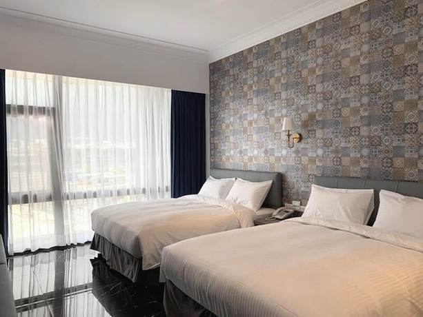 Imagen de la habitación del Hotel Champ de Roses. Foto 18