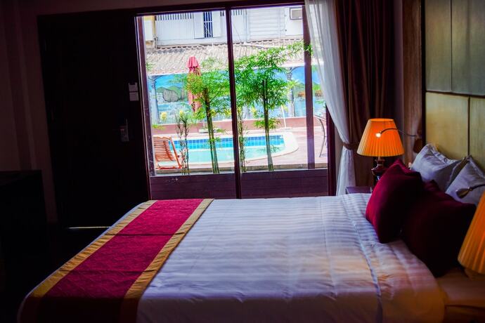 Imagen de la habitación del Hotel Champa Garden. Foto 11
