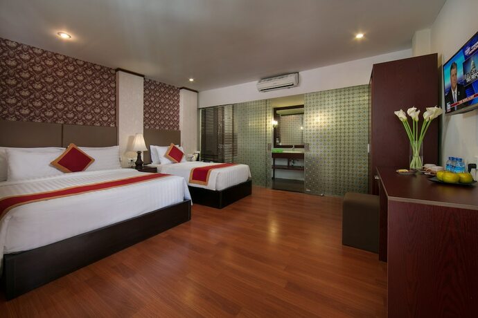 Imagen de la habitación del Hotel Champa Garden. Foto 15