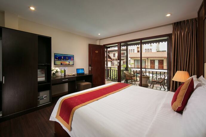 Imagen de la habitación del Hotel Champa Garden. Foto 16