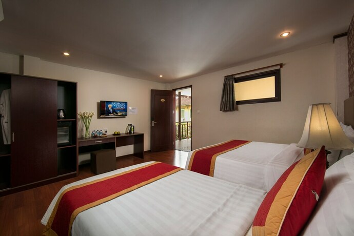 Imagen de la habitación del Hotel Champa Garden. Foto 18