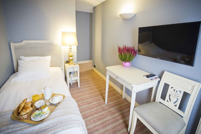 Imagen de la habitación del Hotel Champerret Héliopolis. Foto 7