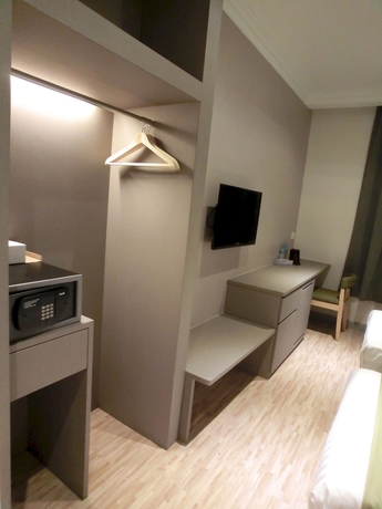 Imagen de la habitación del Hotel Champion. Foto 11