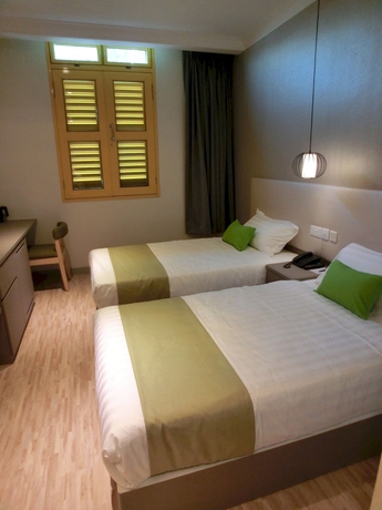 Imagen de la habitación del Hotel Champion. Foto 14